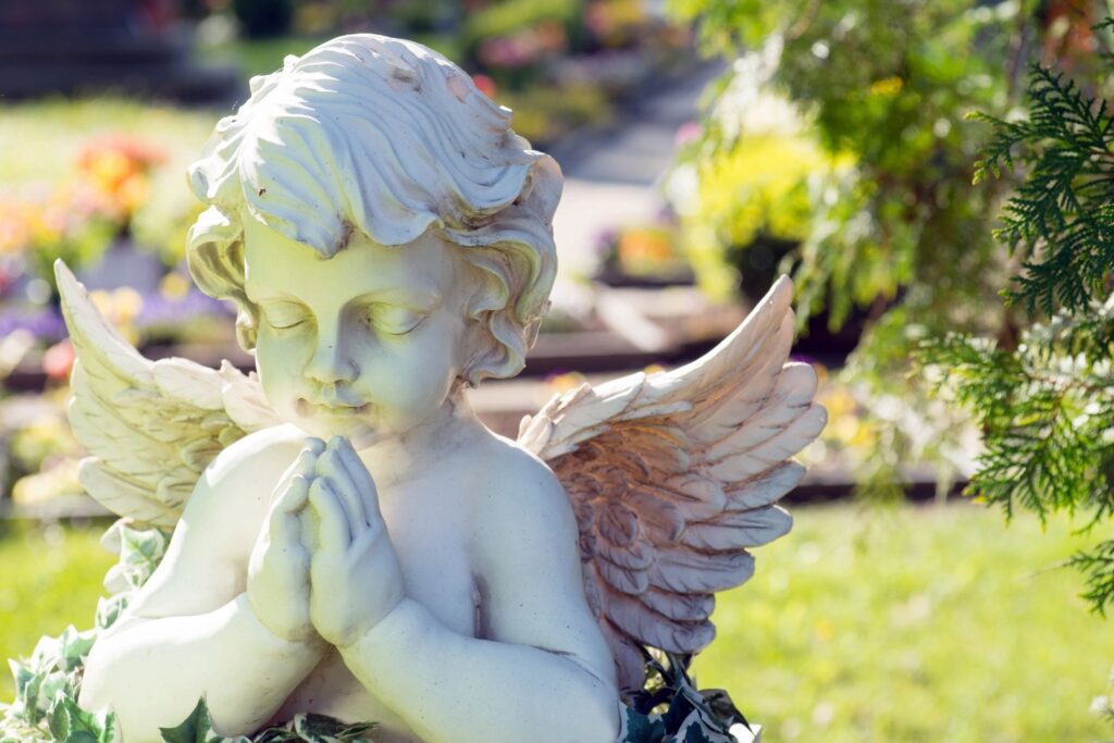 Angel statue at a cemetery, after you're gone, C. B. Hall Insurance agency in Charleston, WV 